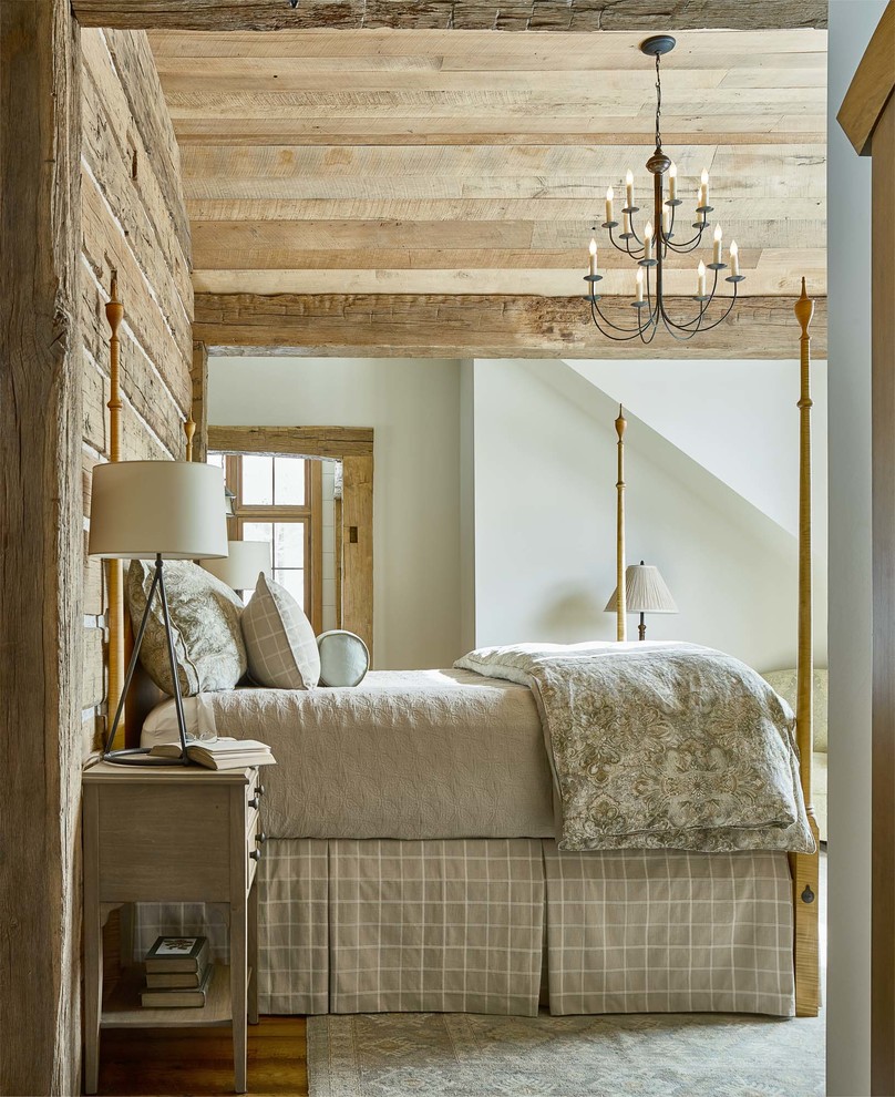 Inspiration för rustika sovrum, med vita väggar, mellanmörkt trägolv och brunt golv