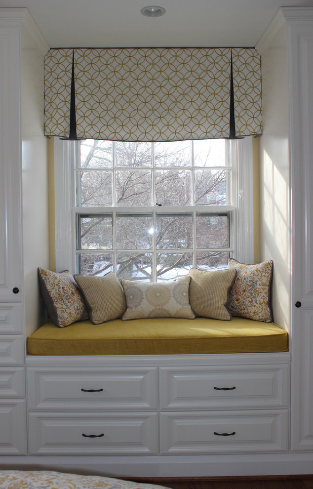 Bedroom - small transitional master medium tone wood floor bedroom idea in Baltimore with yellow walls