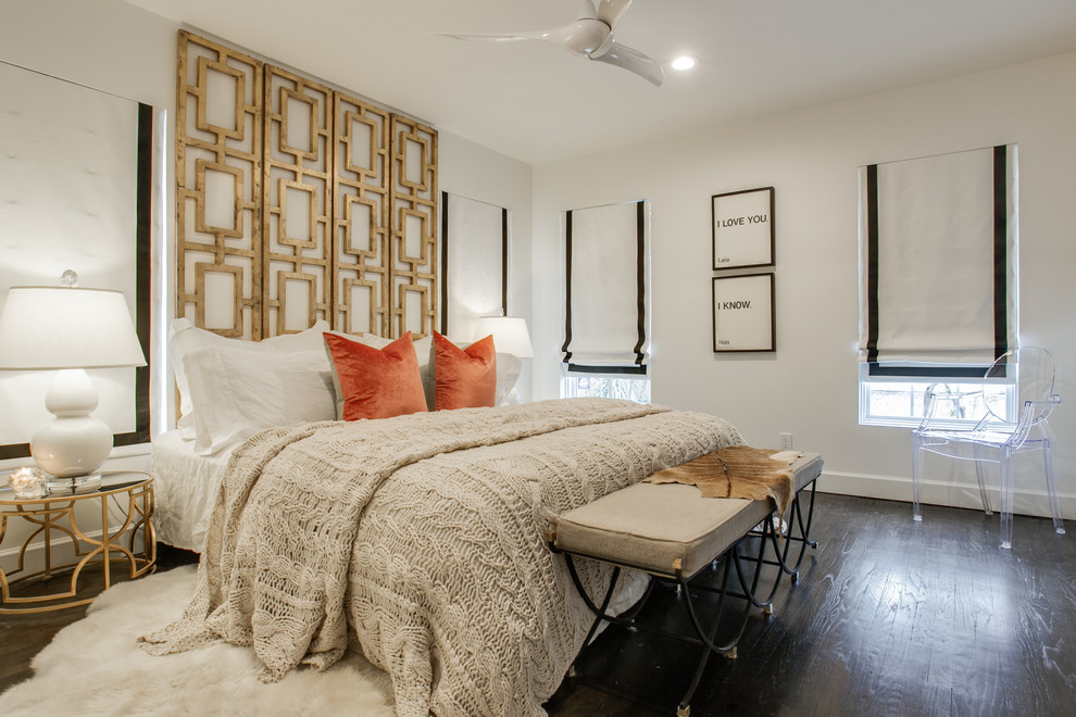 Example of a transitional dark wood floor bedroom design in Dallas with white walls