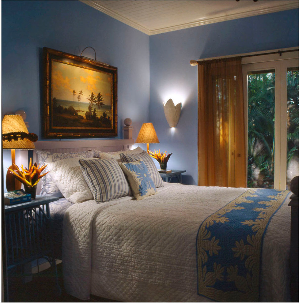 Bedroom - mid-sized tropical guest bedroom idea in Santa Barbara with blue walls