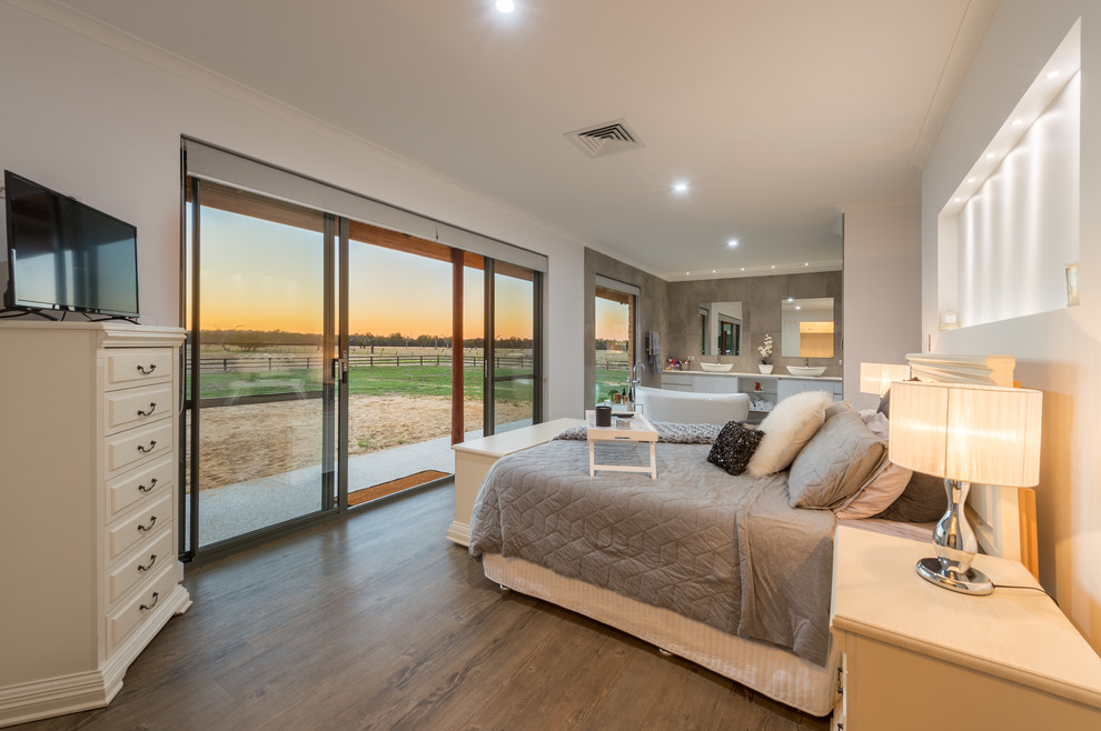 Design ideas for a large farmhouse master bedroom in Perth with white walls and painted wood flooring.