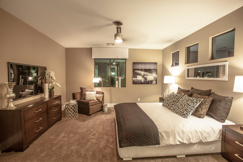 Inspiration for a mid-sized eclectic guest carpeted bedroom remodel in Las Vegas with beige walls and no fireplace