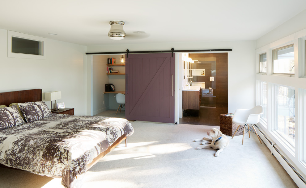 Example of a 1960s master carpeted bedroom design in Denver with white walls and no fireplace