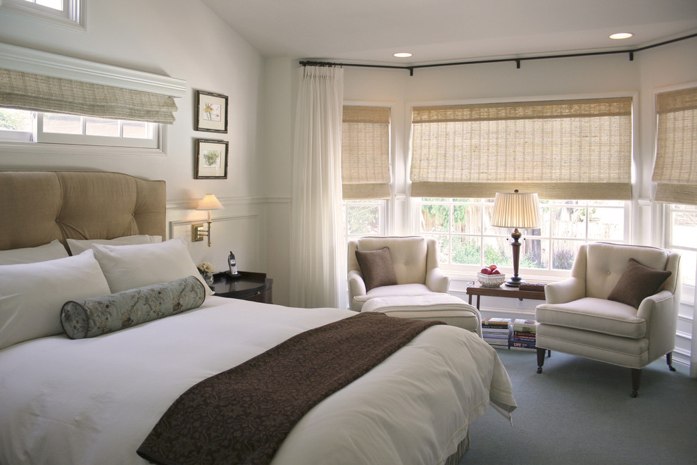 Traditional master and grey and cream bedroom in Los Angeles with white walls, carpet, no fireplace and feature lighting.