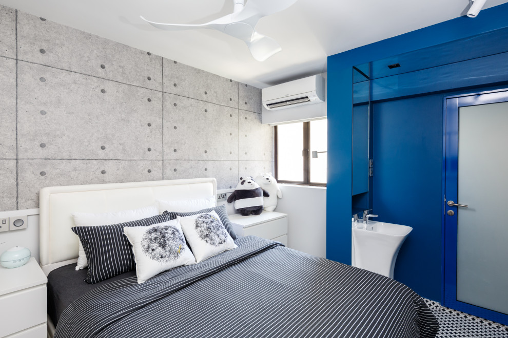 Ispirazione per una camera da letto design con pareti grigie e pavimento multicolore