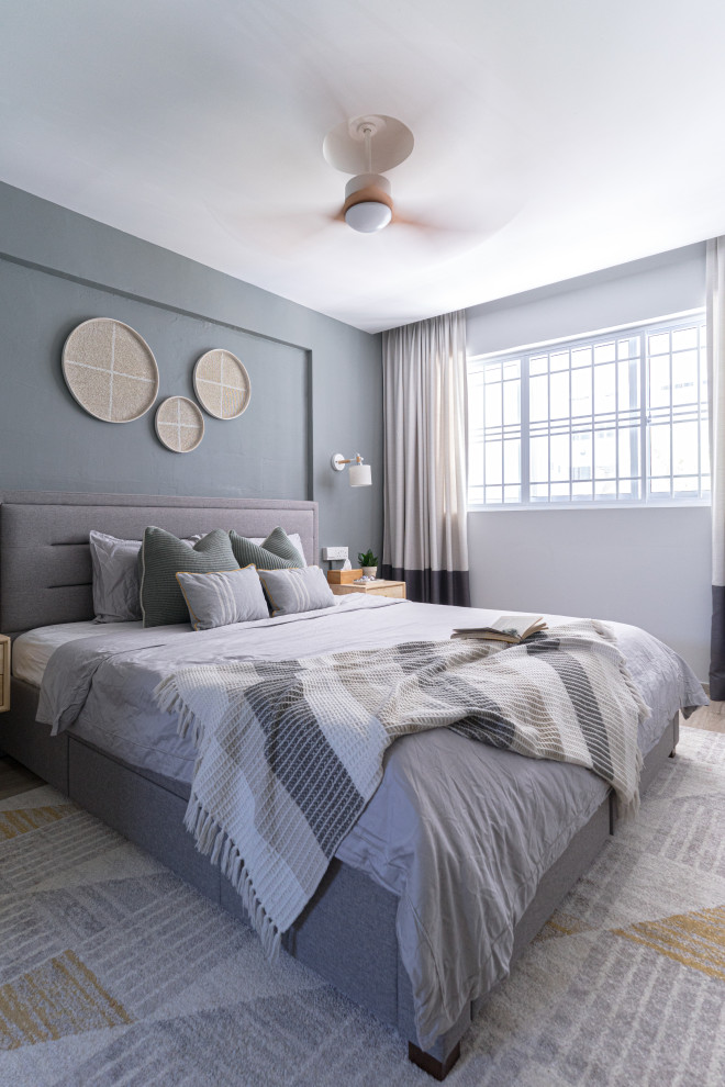 Mid-sized trendy master beige floor bedroom photo in Wellington with gray walls
