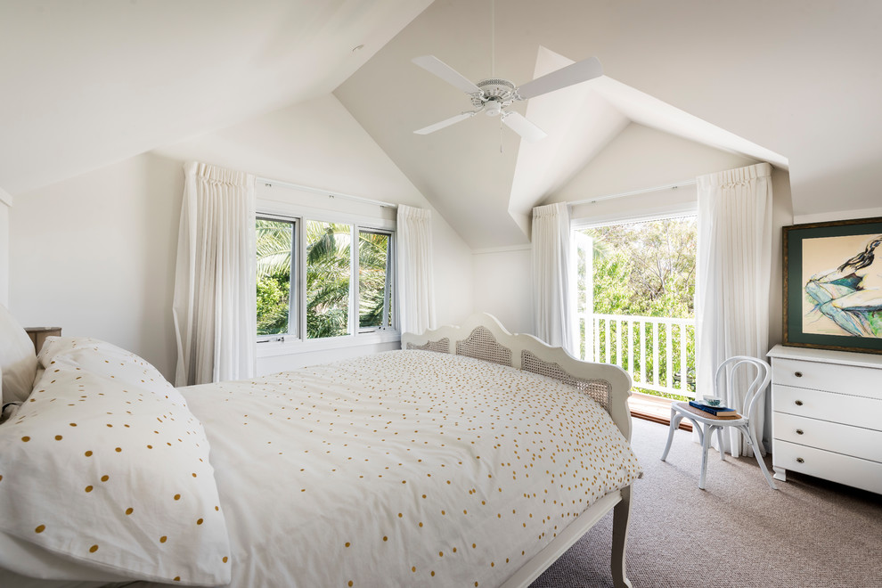 Medium sized beach style mezzanine bedroom in Perth with white walls, carpet and no fireplace.