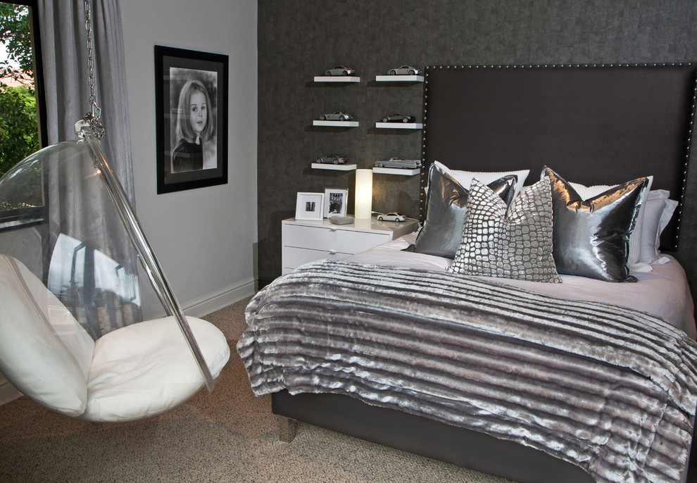 Contemporary bedroom in Other with black walls, carpet and no fireplace.