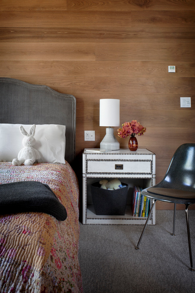 This is an example of a contemporary bedroom in San Francisco with carpet.