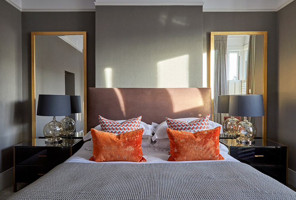 Inspiration for a contemporary grey and brown bedroom in London with grey walls.