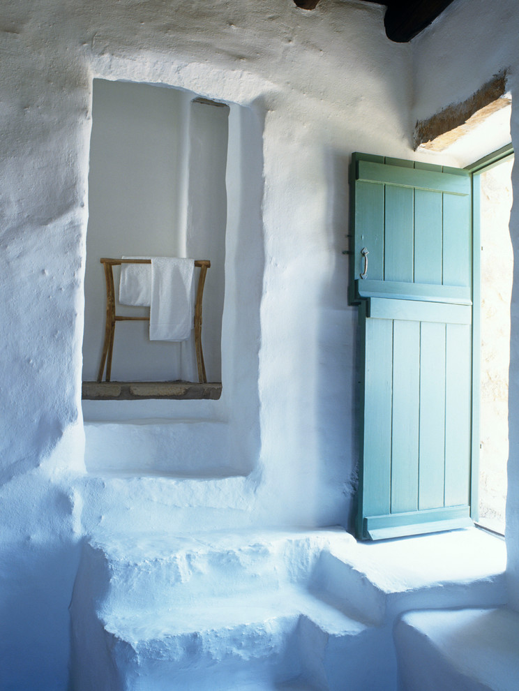 Example of a tuscan bedroom design in Other