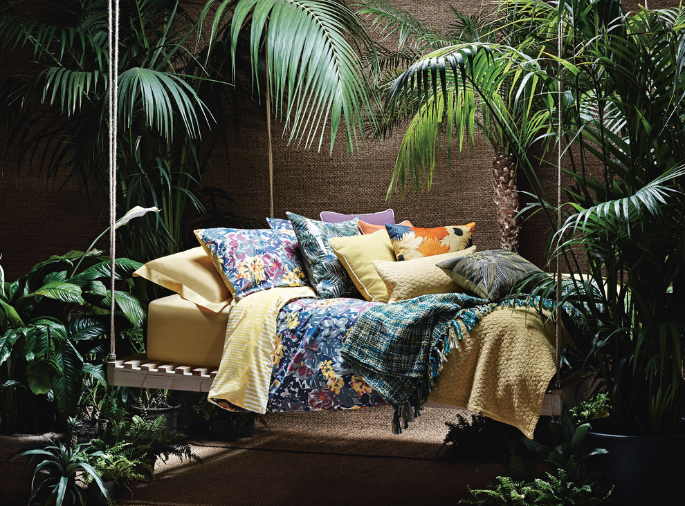 Bedroom - tropical bedroom idea in London