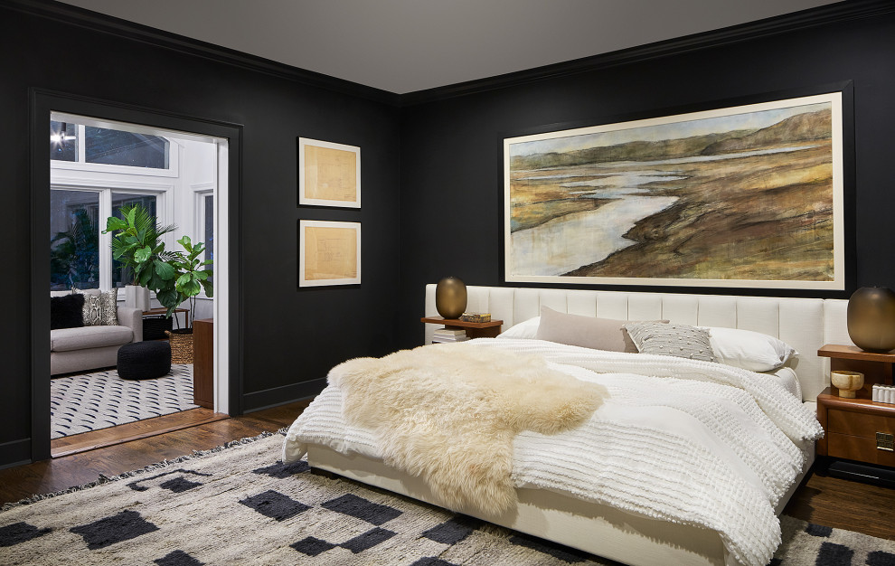 Design ideas for a contemporary master bedroom in Chicago with black walls.