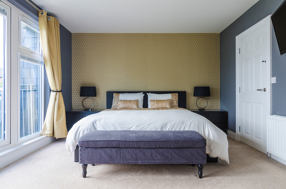 Design ideas for a traditional master bedroom in Belfast with multi-coloured walls, carpet and a feature wall.