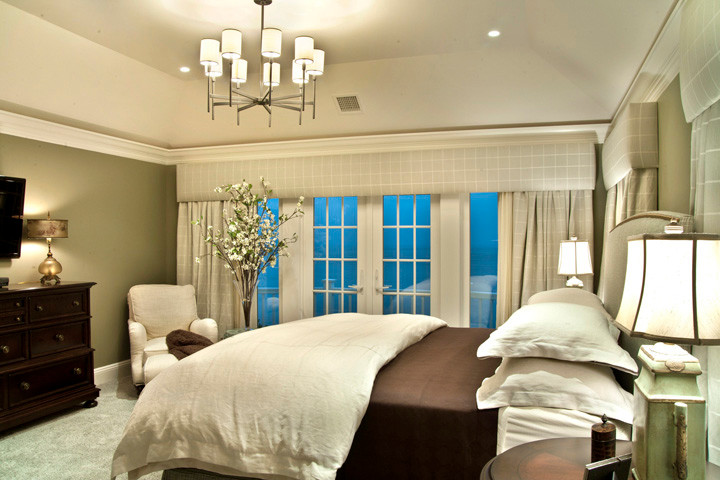 This is an example of a coastal grey and cream bedroom in New York.
