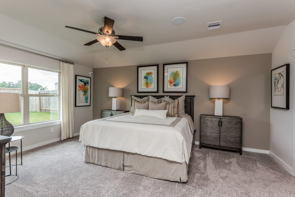 Inspiration for a mid-sized contemporary master carpeted and beige floor bedroom remodel in Houston with beige walls