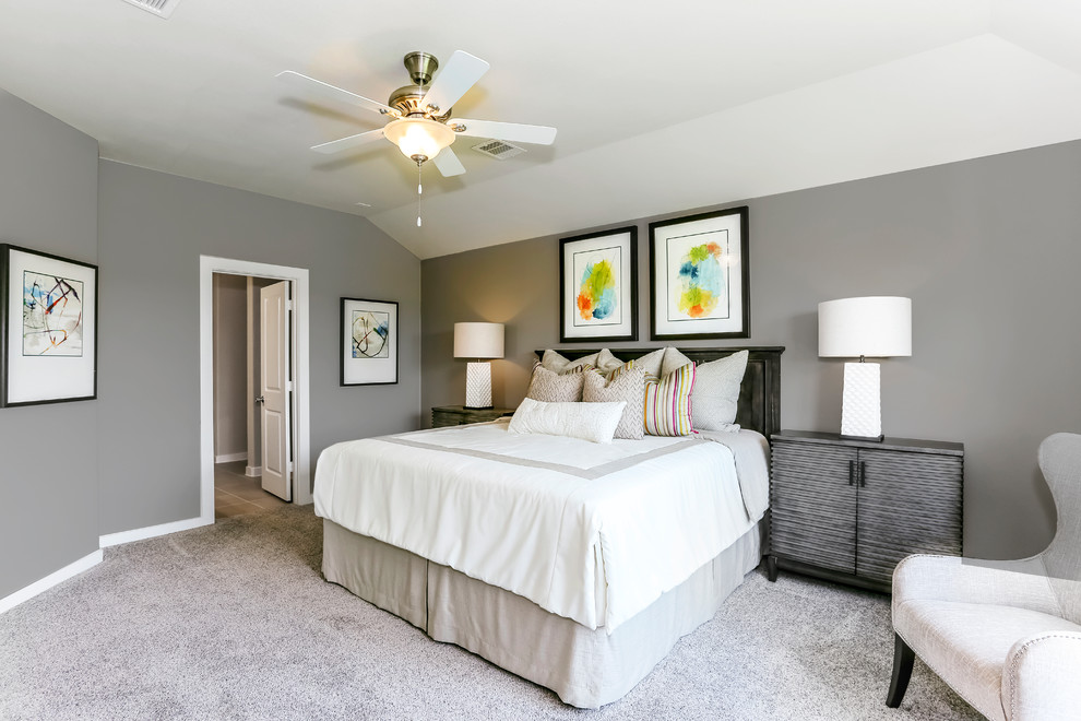 Mid-sized transitional master carpeted and gray floor bedroom photo in Houston with gray walls