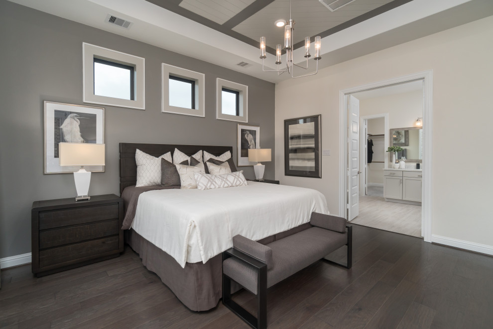 Bedroom - mid-sized contemporary master dark wood floor and brown floor bedroom idea in Houston with beige walls