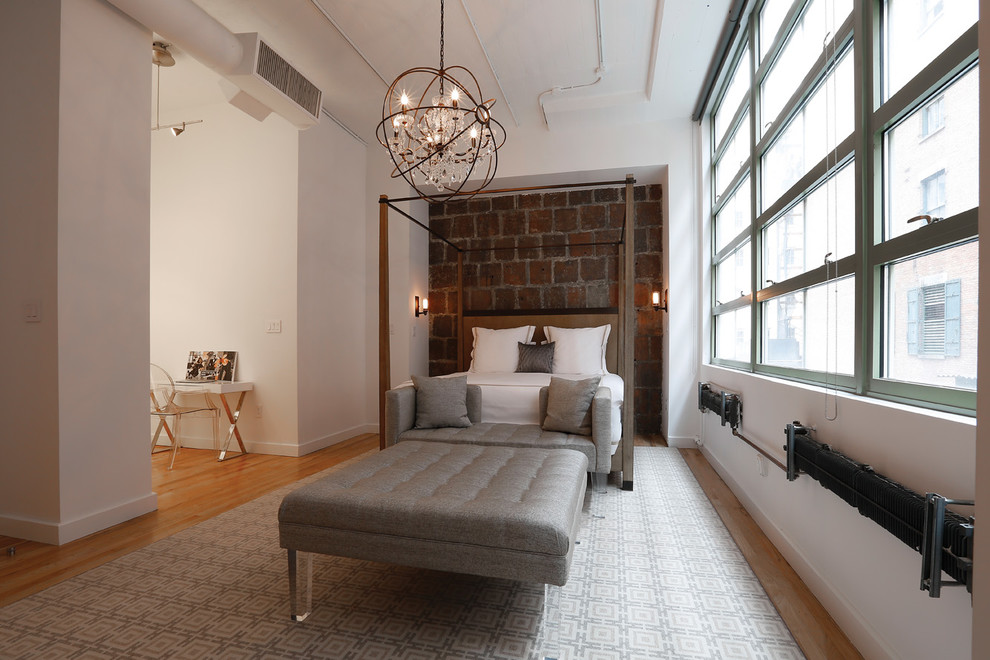 Contemporary bedroom in New York with white walls.
