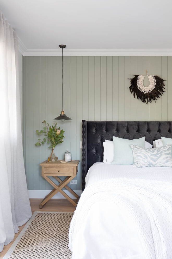 This is an example of a coastal bedroom in Sydney.