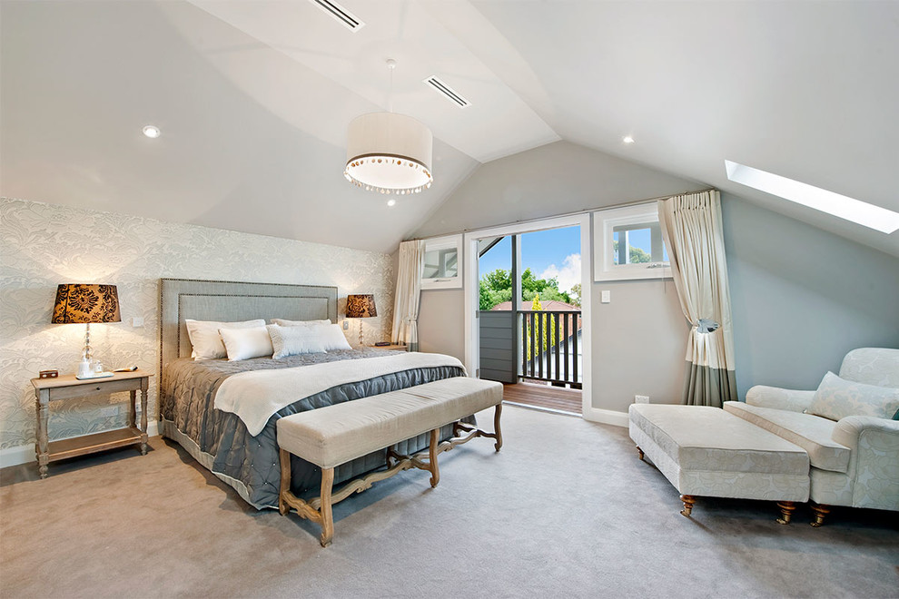 Inspiration for a large timeless master carpeted and brown floor bedroom remodel in Sydney with gray walls and no fireplace
