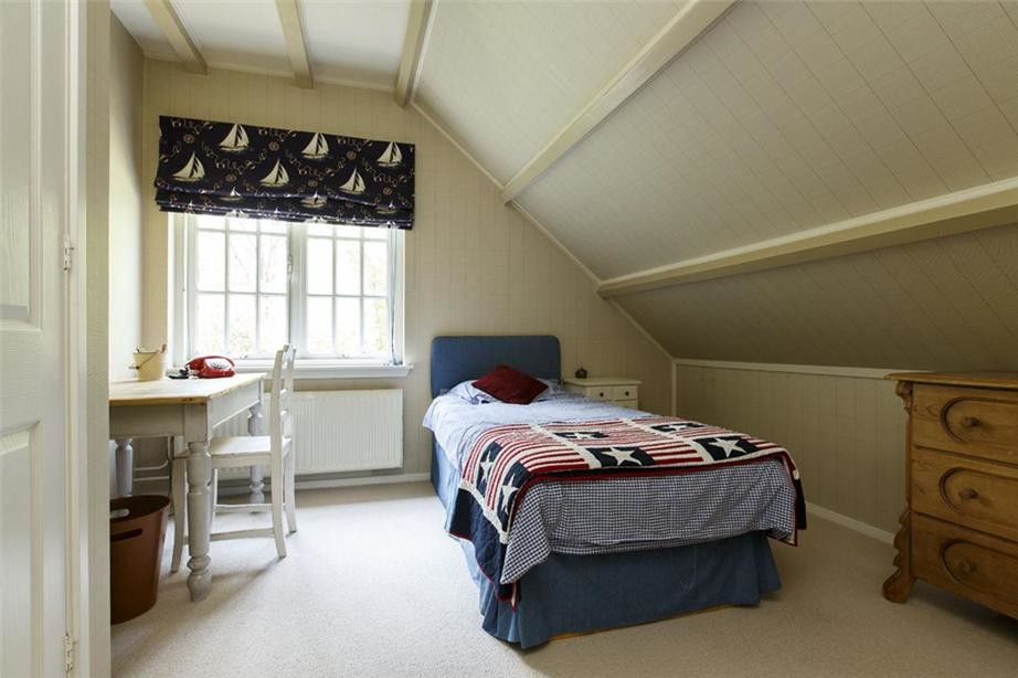 Photo of a medium sized eclectic master bedroom in Amsterdam with beige walls and carpet.