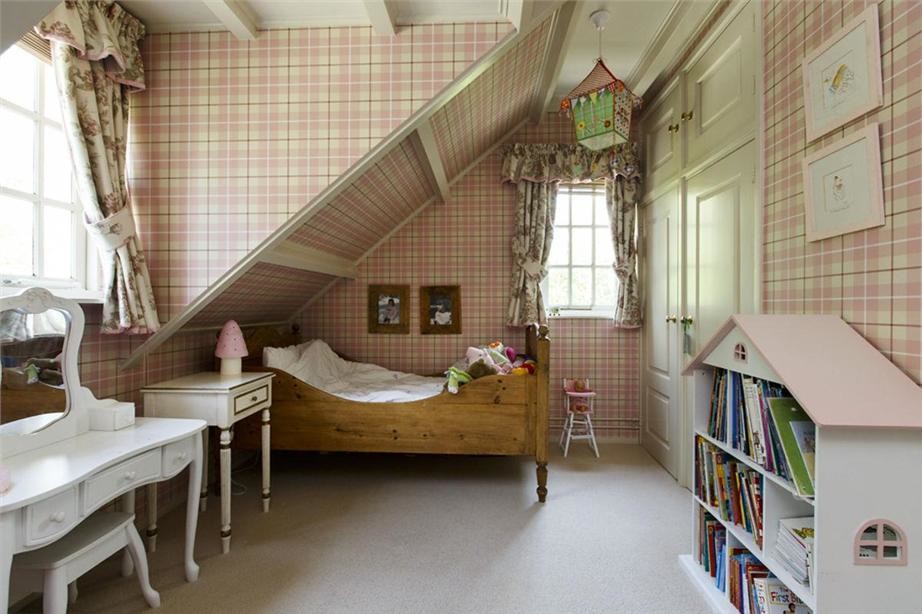 Photo of a medium sized rural master bedroom in Amsterdam with pink walls and carpet.