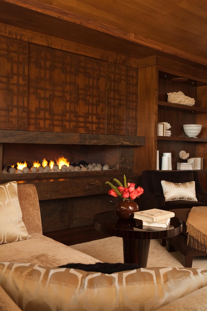Inspiration for a contemporary bedroom remodel in Orange County with a ribbon fireplace