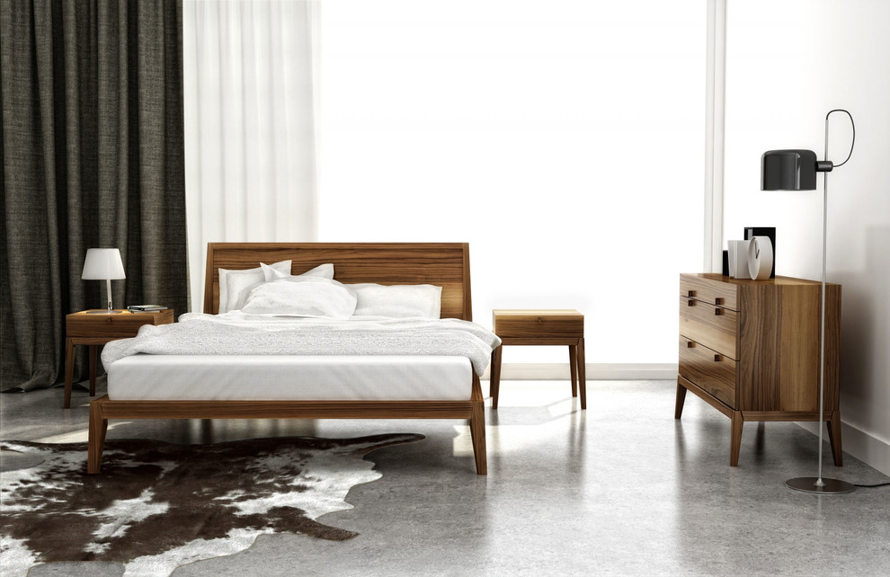 Modernes Hauptschlafzimmer mit weißer Wandfarbe und Betonboden in Vancouver