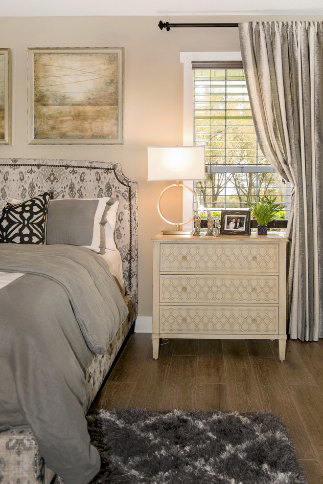 Example of a transitional bedroom design in Orlando