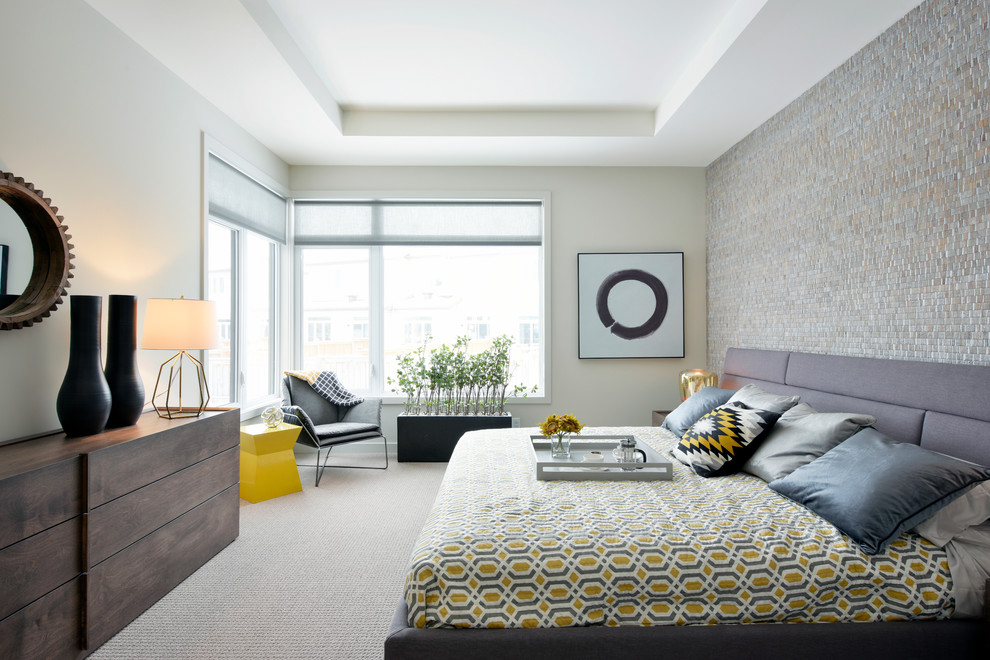 Example of a trendy carpeted and beige floor bedroom design in Toronto with multicolored walls