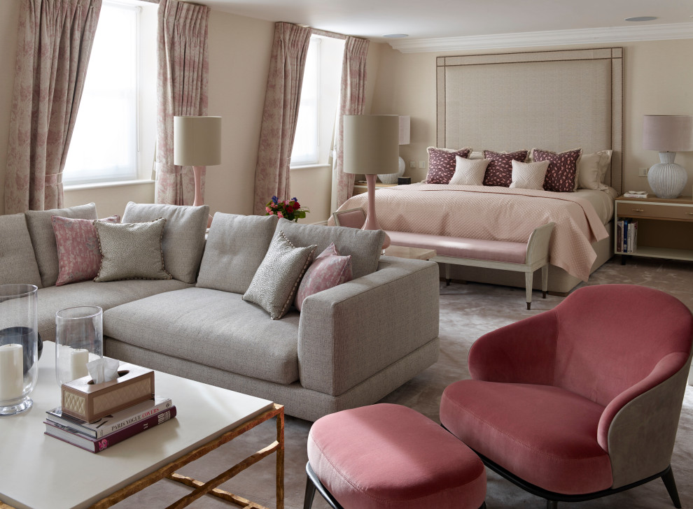 Inspiration for an expansive classic master and grey and pink bedroom in London with beige walls, carpet and beige floors.