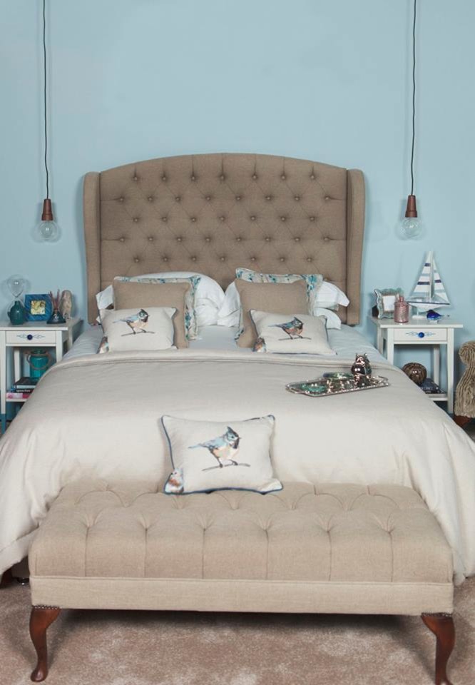 Inspiration for a medium sized beach style master bedroom in Dublin with blue walls, carpet and beige floors.