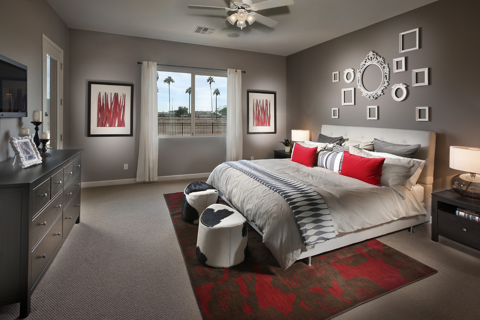 Modelo de dormitorio actual con moqueta y paredes grises