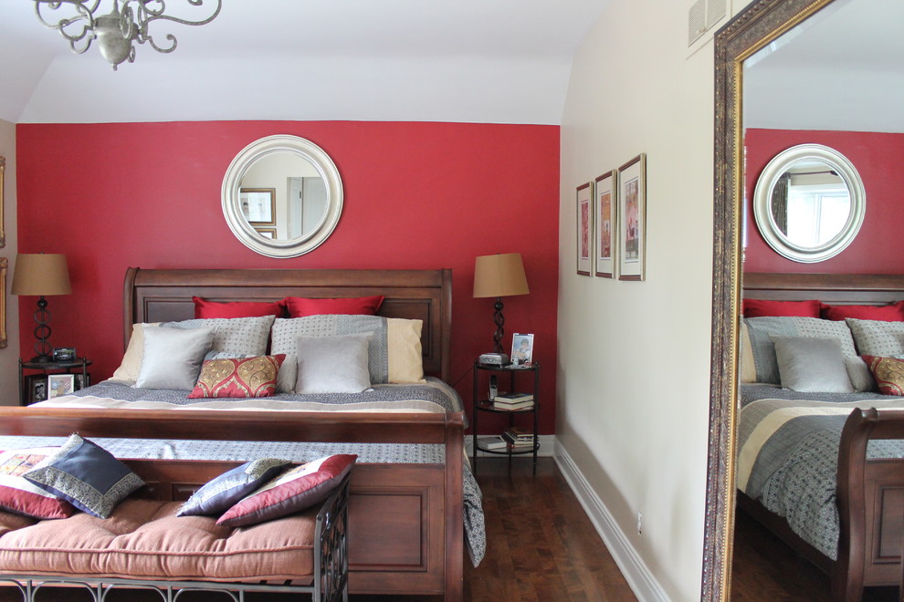 Bedroom - mid-sized transitional master medium tone wood floor bedroom idea in Montreal with red walls