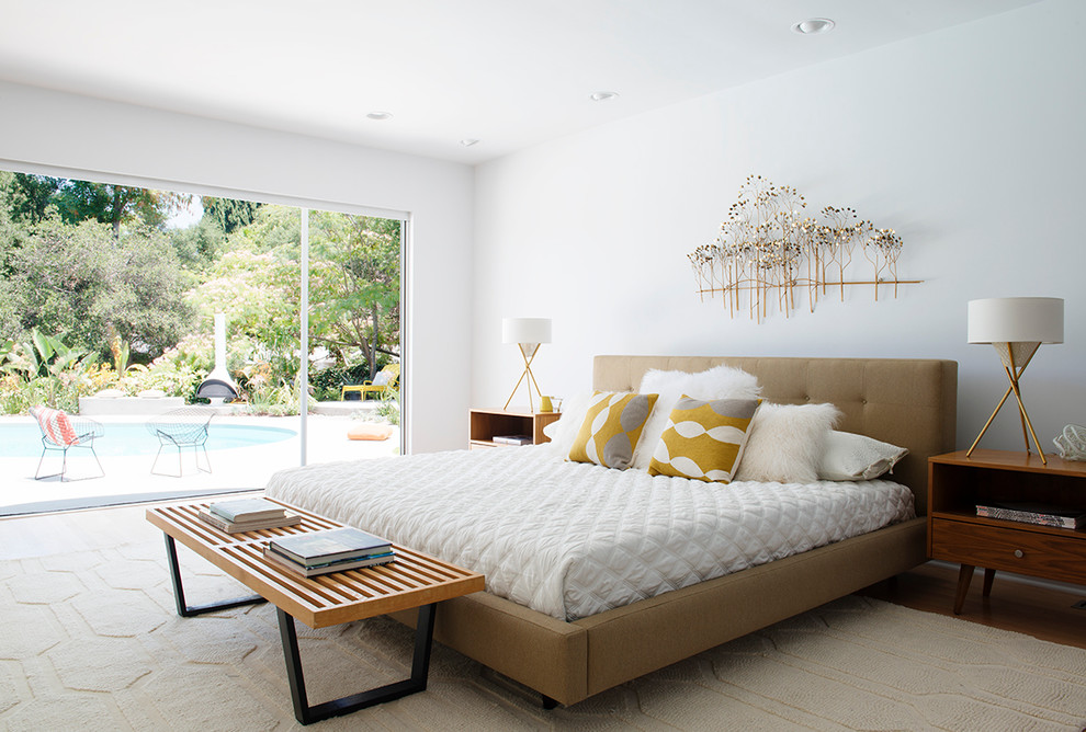 Bedroom - large mid-century modern master medium tone wood floor and brown floor bedroom idea in Los Angeles with gray walls and no fireplace