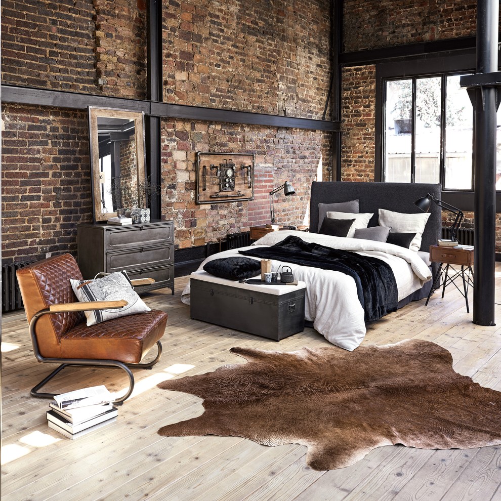 Inspiration for an industrial bedroom in London.