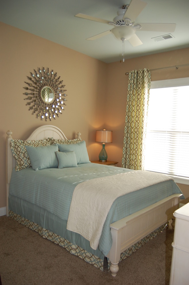 Medium sized classic guest bedroom in Other with beige walls, carpet, no fireplace and beige floors.