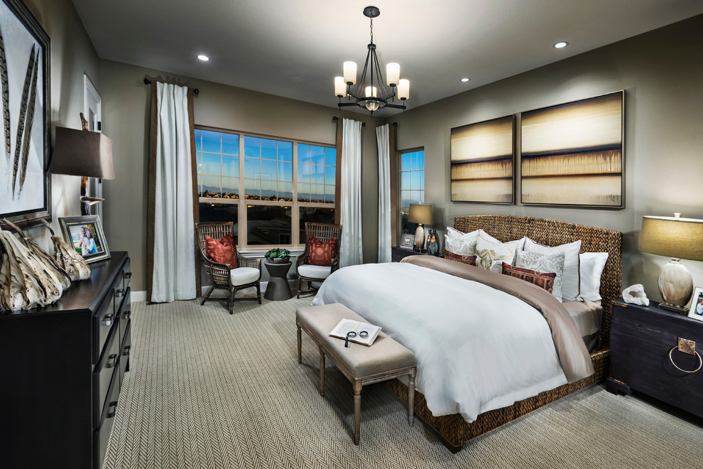 Large master bedroom in Denver with beige walls and carpet.