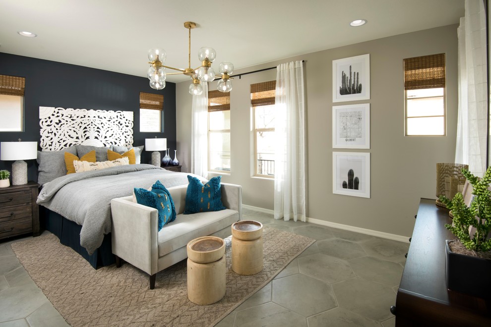 Imagen de dormitorio principal contemporáneo de tamaño medio con paredes grises, suelo gris y suelo de baldosas de porcelana