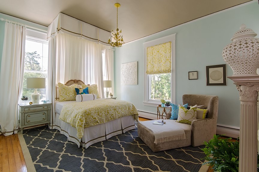 Design ideas for a large classic bedroom in Richmond with blue walls and light hardwood flooring.