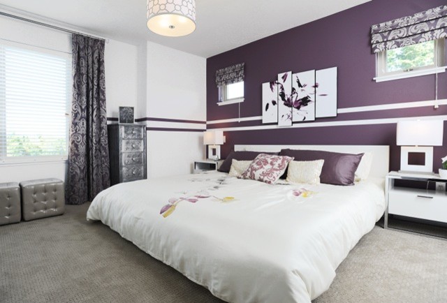 Design ideas for a medium sized contemporary master and grey and silver bedroom in Vancouver with purple walls and carpet.