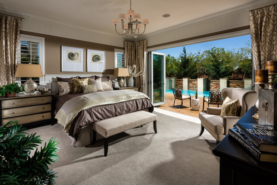 Example of a mid-sized transitional master carpeted and gray floor bedroom design in Las Vegas with brown walls and no fireplace
