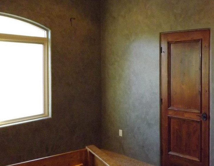 Elegant slate floor and gray floor bedroom photo in Albuquerque with gray walls