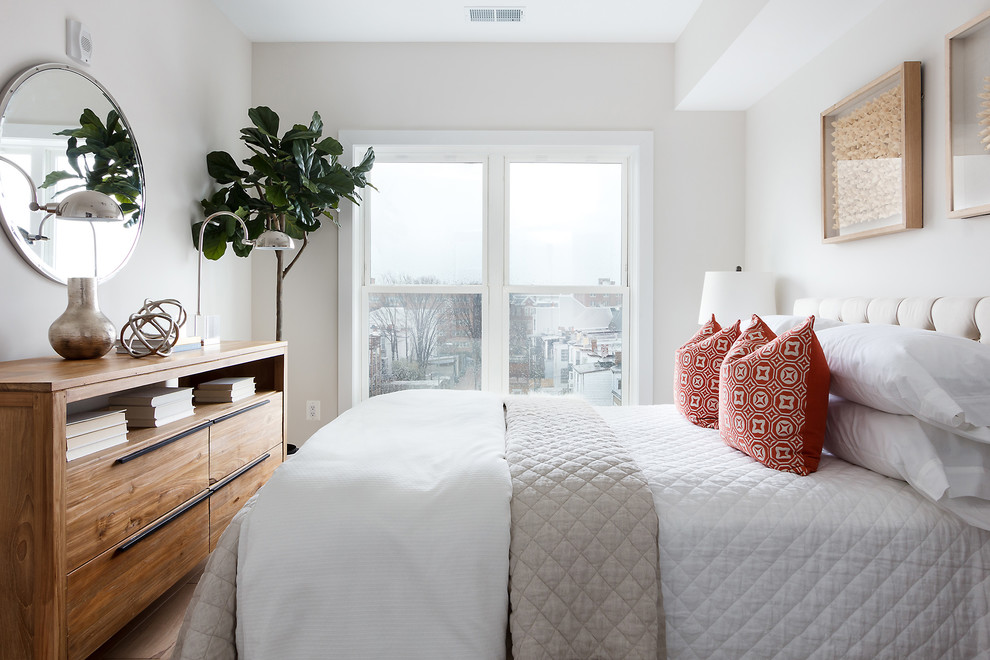 Transitional guest bedroom photo in Other with white walls