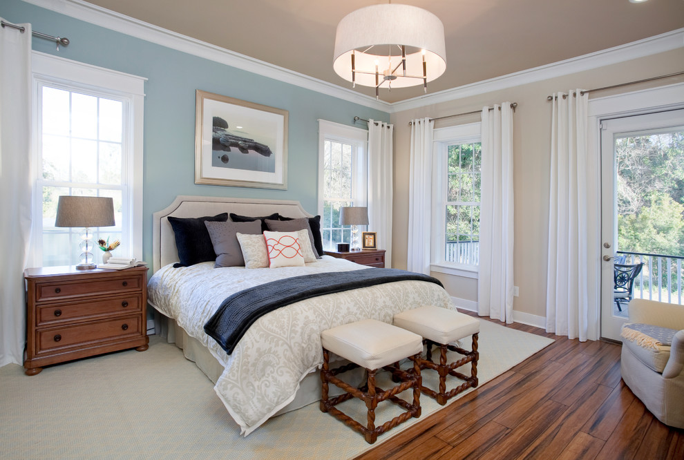 This is an example of a traditional master bedroom in San Francisco with no fireplace and a feature wall.