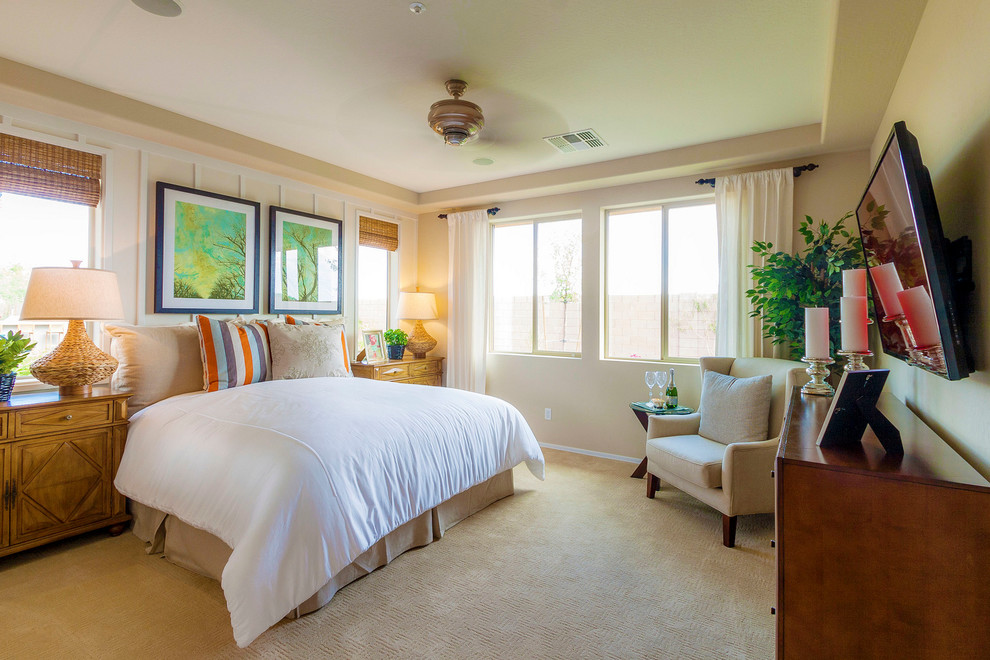 Inspiration for a medium sized modern master bedroom in Phoenix with beige walls and carpet.