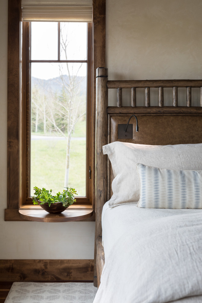 Design ideas for a rustic bedroom in Jackson.