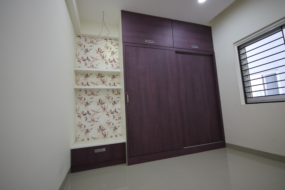 Example of an asian bedroom design in Hyderabad