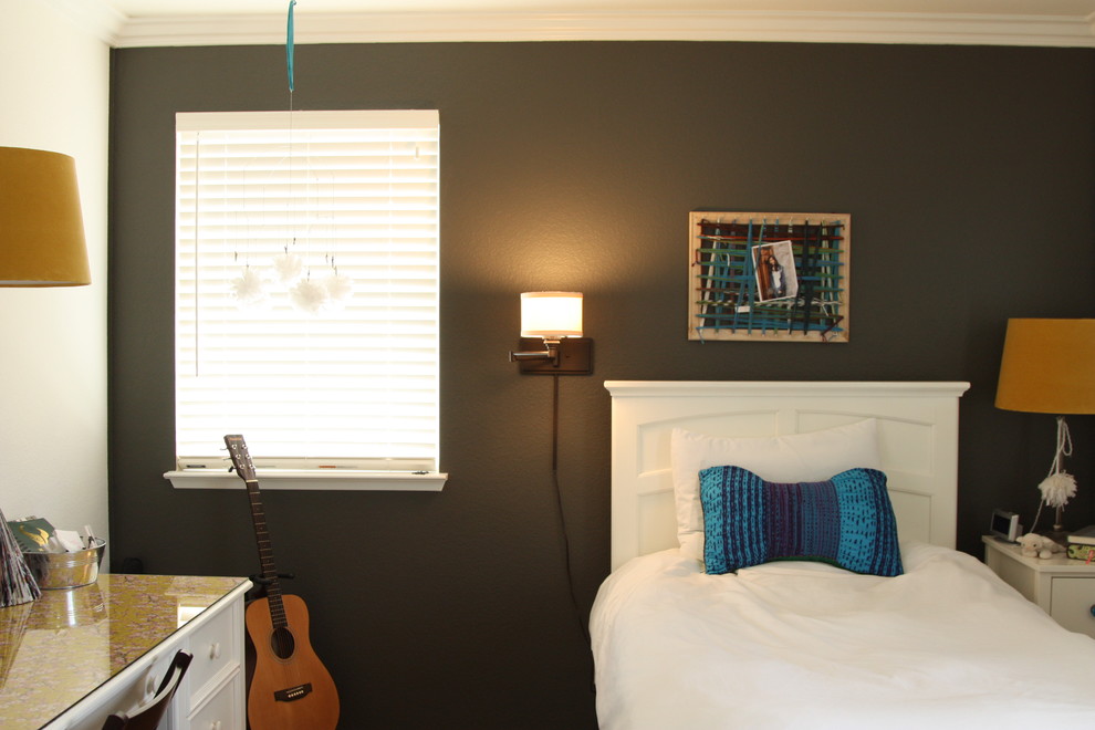 Eclectic bedroom in San Diego with grey walls.
